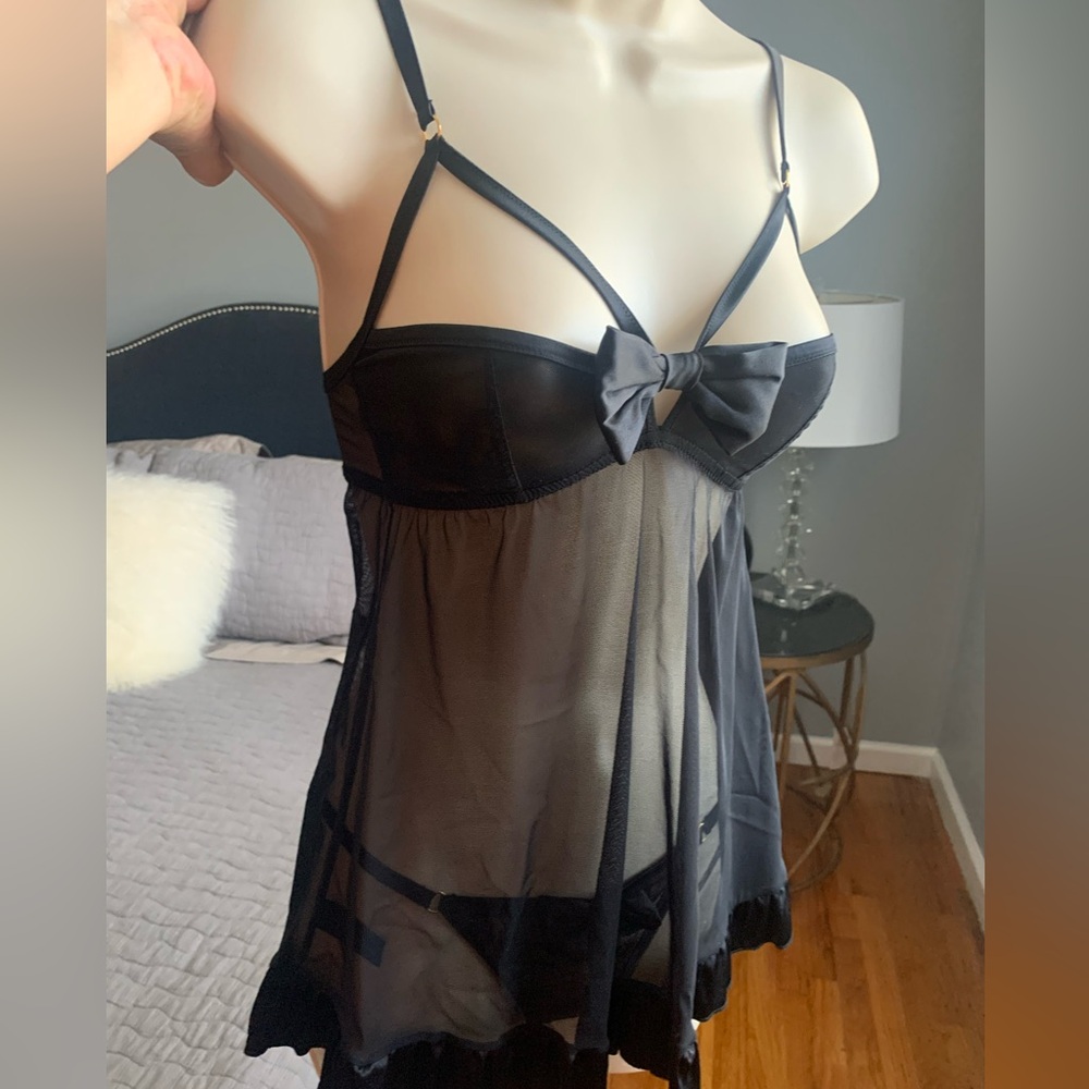 Myla black satin bow and mesh babydoll with matching thong.